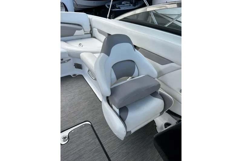 Slide: The Image of 2020 Four Winns HD240 OB boat interior with sleek, modern seating design. - 26
