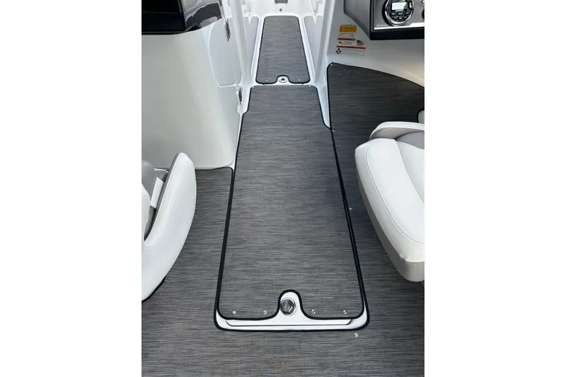 Slide: The Image of Interior view of 2020 Four Winns HD240 OB boat, featuring sleek seating and flooring. - 36