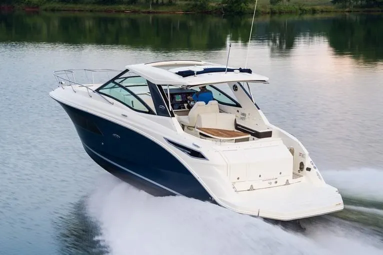 Slide: The Image of Manufacturer Provided Image: 2021 Sea Ray Sundancer 320 cruising on a calm lake. - 3
