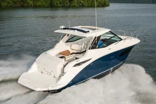 Slide: The Image of Manufacturer Provided Image: 2021 Sea Ray Sundancer 320 cruising on a lake. - 4