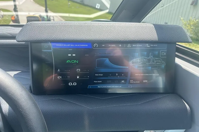 Slide: The Image of 2026 Nautique Super Air Nautique G23 dashboard display with advanced controls and navigation. - 19