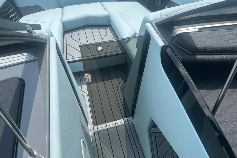 Slide: The Image of 2026 Nautique Super Air Nautique G23 interior with sleek seating and modern design. - 30
