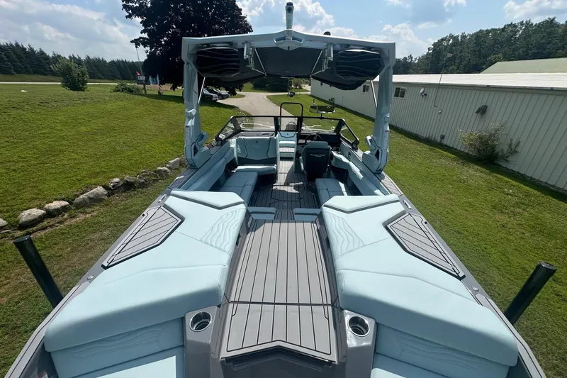 Slide: The Image of 2026 Nautique Super Air Nautique G23 boat interior with spacious seating and modern design. - 9