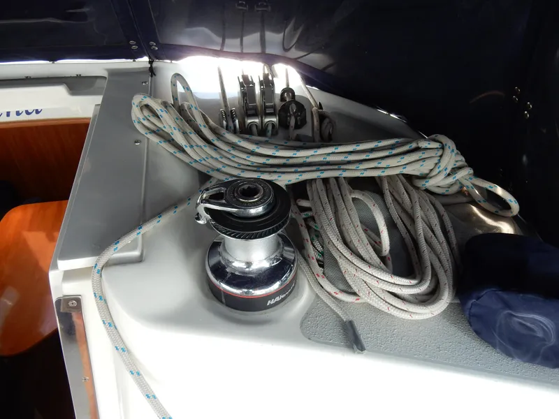 Slide: The Image of Winch and ropes on a 2004 Catalina 350 sailboat deck. - 49