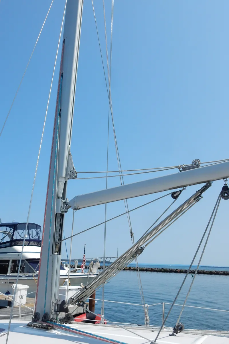Slide: The Image of Mast and rigging of a 2004 Catalina 350 sailboat docked at a marina. - 9