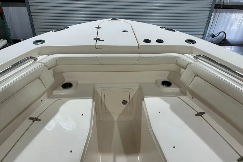 Slide: The Image of 2019 Grady-White Canyon 336 boat interior with seating and storage compartments. - 5