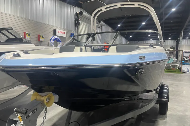 Slide: The Image of 2025 Yamaha Boats 195S displayed indoors, showcasing sleek design and modern features. - 0
