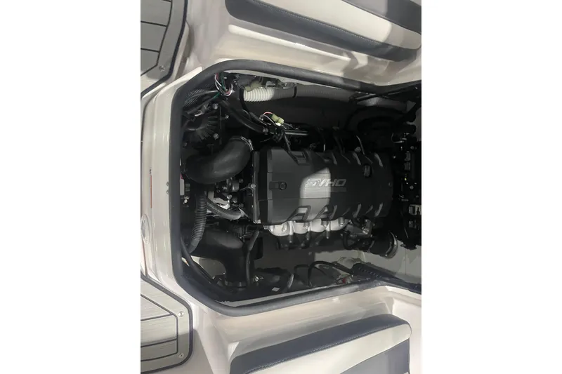 Slide: The Image of Engine compartment of 2025 Yamaha Boats 195S, showcasing the powerful SVHO engine. - 10
