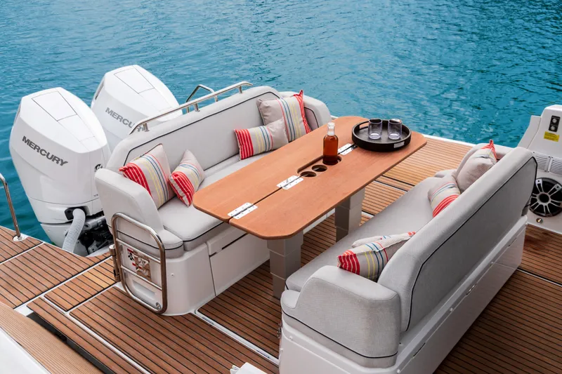 Slide: The Image of Luxurious seating area on 2026 Beneteau Gran Turismo 35 yacht with Mercury engines. - 13