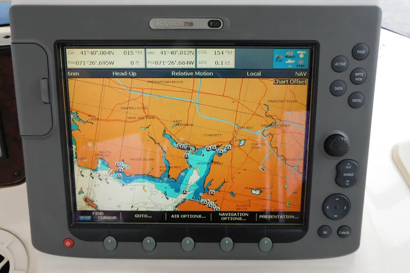Slide: The Image of Navigation system on a 2003 Sea Ray 480 Sedan Bridge displaying a nautical chart. - 17