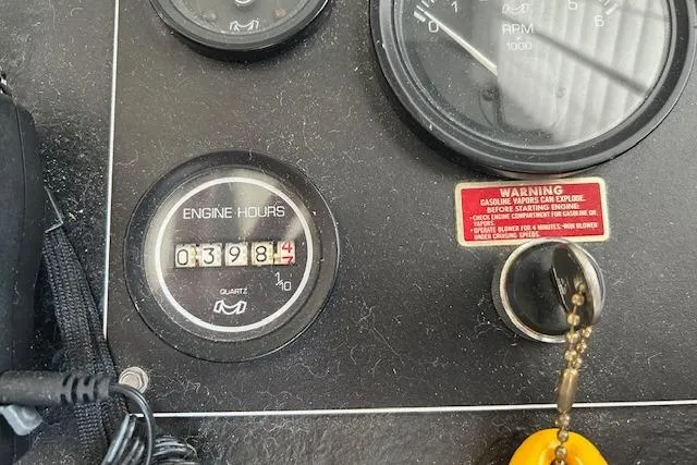 Slide: The Image of Interior of a 1987 Somerset Houseboat 14X60 with modern kitchen and dining area. - 21