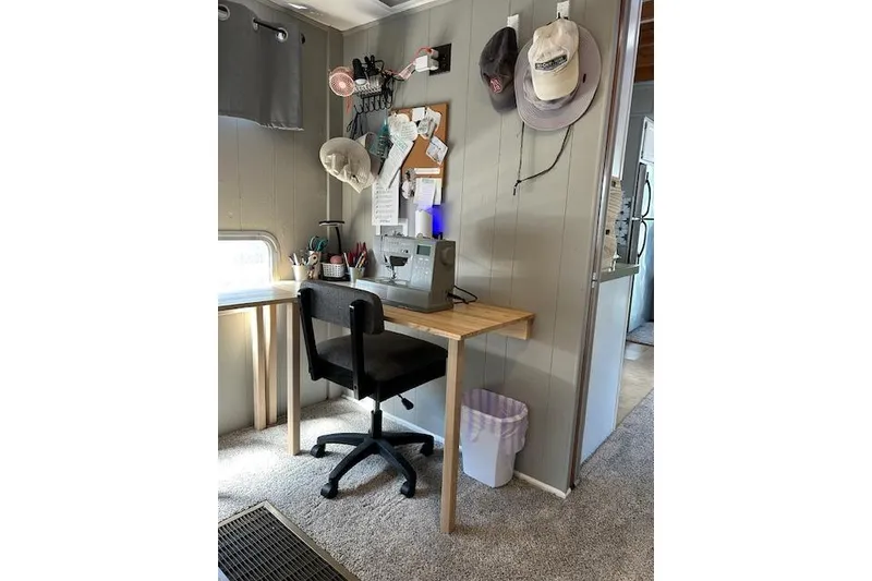 Slide: The Image of Control panel of 1987 Somerset Houseboat 14X60 showing engine hours and warning label. - 24