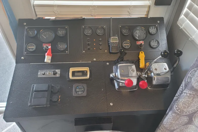 Slide: The Image of Xantrex inverter charger in a 1987 Sumerset 14x60 houseboat. - 37