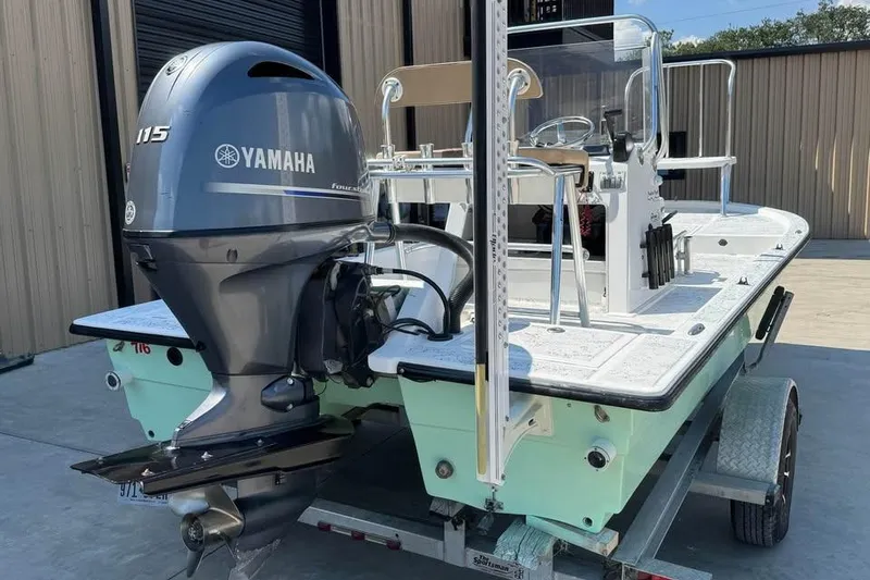 Slide: The Image of 2008 Shallow Sport 18SS boat with Yamaha 115 engine on trailer. - 3