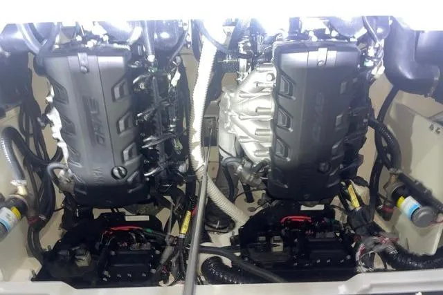 Slide: The Image of 2025 Yamaha Boats 255XD engine compartment showcasing dual powerful engines. - 2