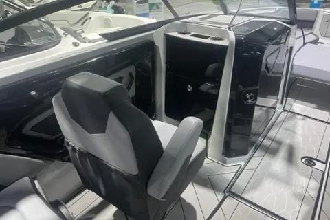 Slide: The Image of 2025 Yamaha Boats 255XD interior with sleek seating and modern dashboard design. - 7
