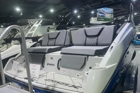 Slide: The Image of 2025 Yamaha Boats 255XD on display, featuring sleek seating and modern design. - 9