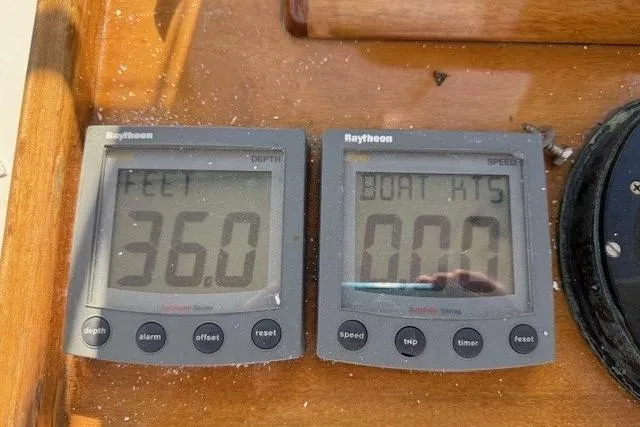 Slide: The Image of Depth and speed gauges on a 1975 Jarvis Newman 32 DEC boat. - 19