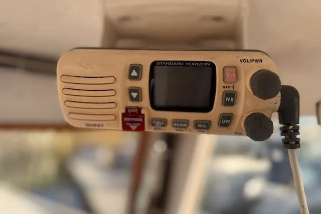 Slide: The Image of Standard Horizon marine radio inside a 1975 Jarvis Newman 32 DEC boat. - 21