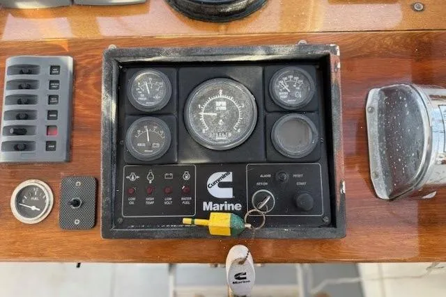 Slide: The Image of Control panel of a 1975 Jarvis Newman 32 DEC boat with Cummins Marine gauges. - 27