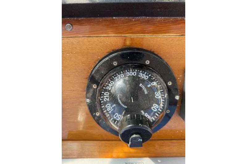 Slide: The Image of Compass on a 1975 Jarvis Newman 32 DEC boat dashboard. - 29