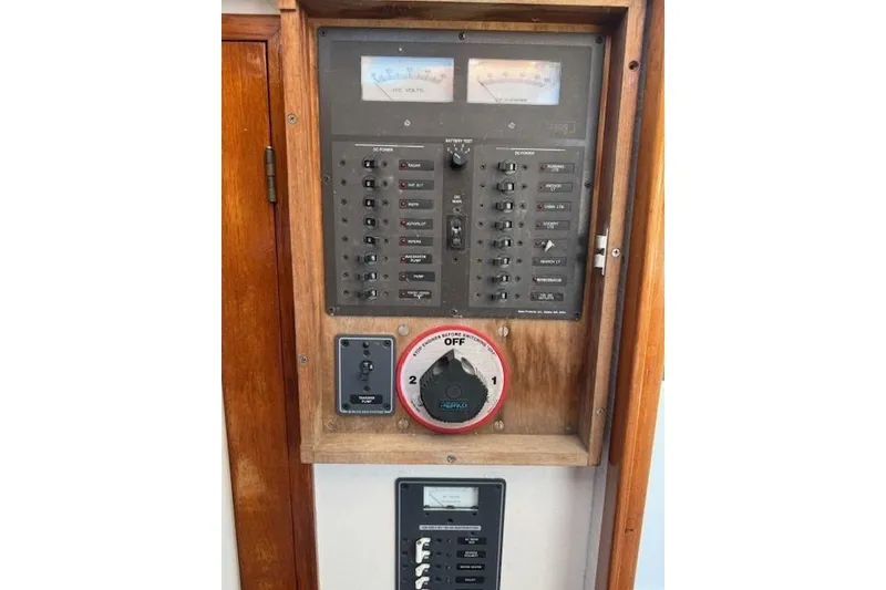 Slide: The Image of Electrical control panel on a 1975 Jarvis Newman 32 DEC boat. - 64
