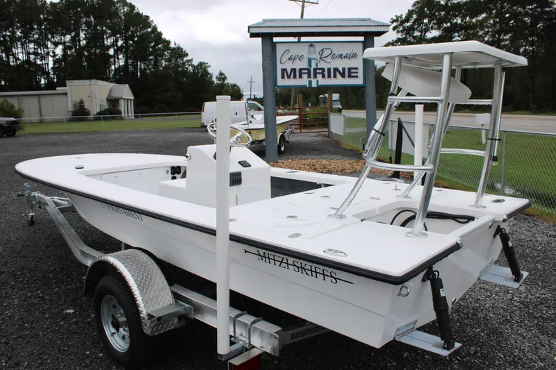 Slide: The Image of 2026 Mitzi Skiffs 17 Tournament boat on trailer at Cape Romain Marine dealership. - 1