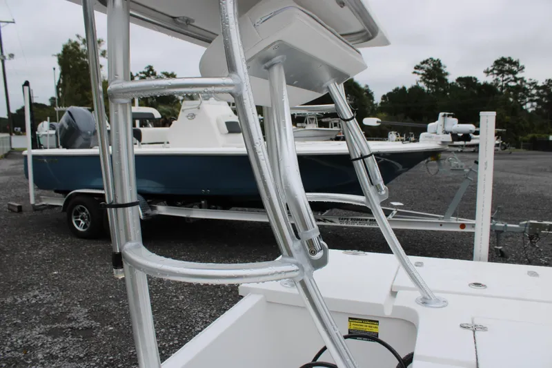Slide: The Image of 2026 Mitzi Skiffs 17 Tournament boat on trailer, close-up of metal framework. - 2