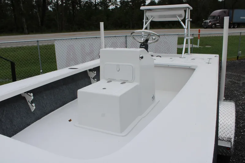 Slide: The Image of 2026 Mitzi Skiffs 17 Tournament boat interior with steering console and seating. - 6