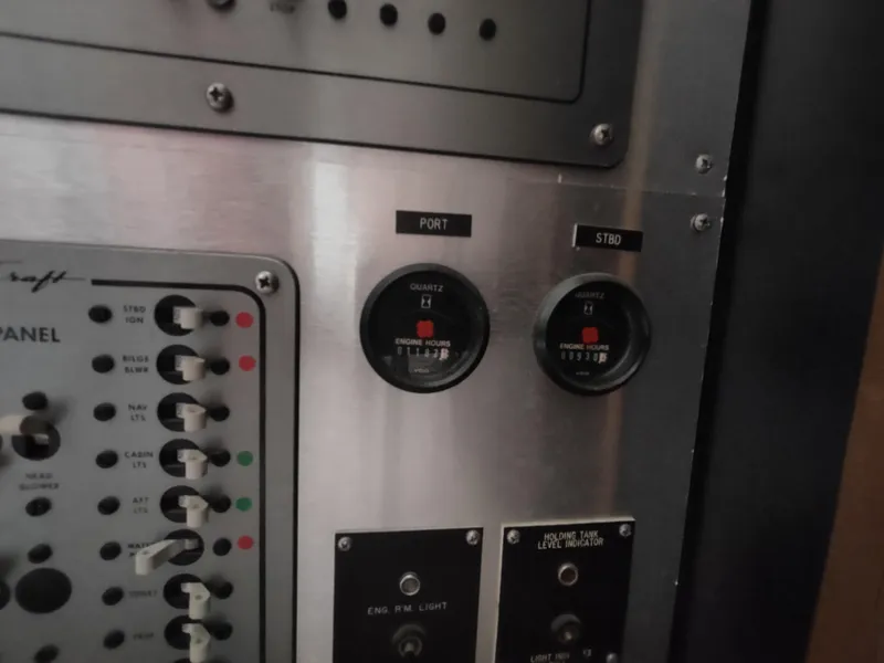 Slide: The Image of Control panel of 1987 Chris-Craft 381 Catalina boat with gauges and switches. - 25