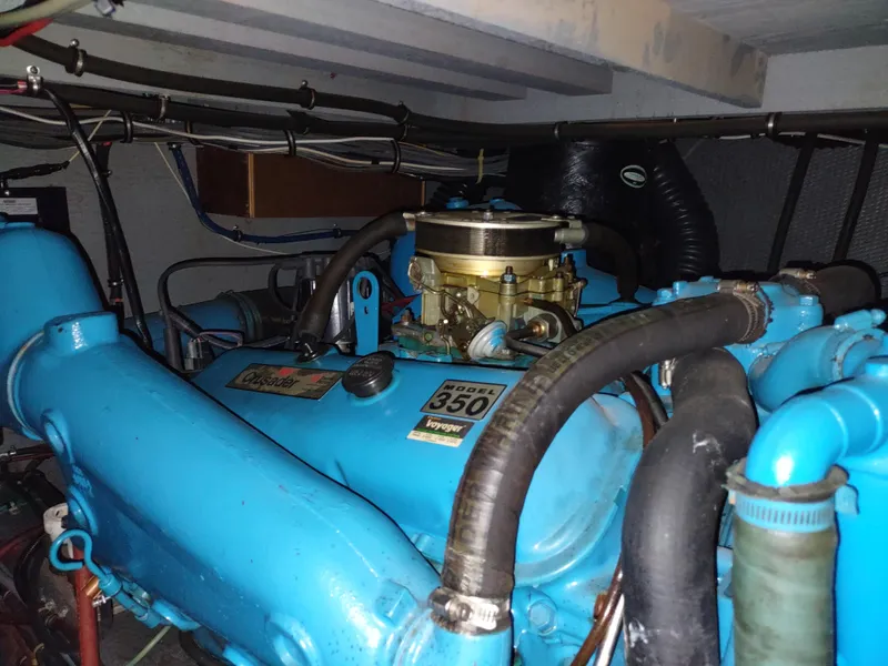 Slide: The Image of Engine of 1987 Chris-Craft 381 Catalina boat, featuring a blue 350 model. - 32