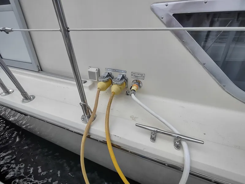 Slide: The Image of 1987 Chris-Craft 381 Catalina yacht with power and water connections on deck. - 4
