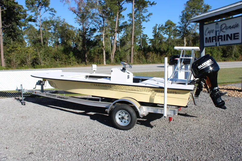 Slide: The Image of 2026 Mitzi Skiffs 17 Tournament boat on trailer, parked at Cape Romain Marine. - 19