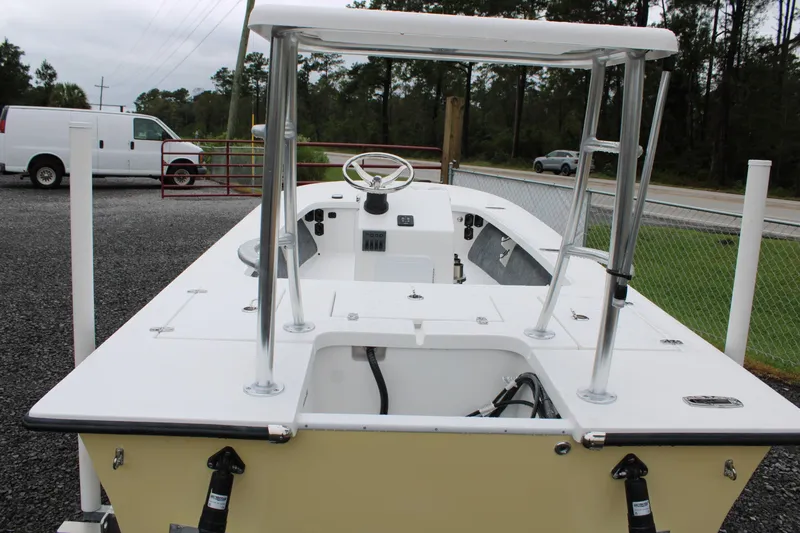 Slide: The Image of 2026 Mitzi Skiffs 17 Tournament boat with 60 HP outboard motor on trailer. - 2