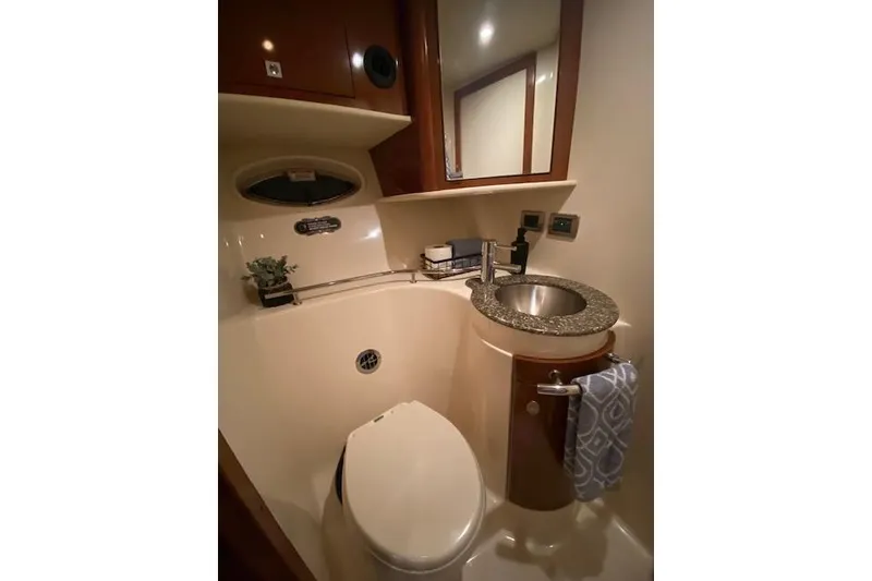Slide: The Image of Luxurious bathroom in 2008 Sea Ray 400 Sundancer yacht with modern fixtures and elegant design. - 13