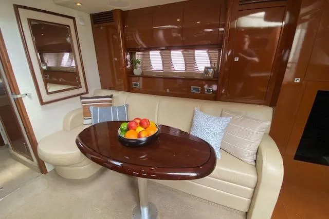 Slide: The Image of Luxurious interior of 2008 Sea Ray 400 Sundancer yacht with elegant seating and fruit bowl. - 21