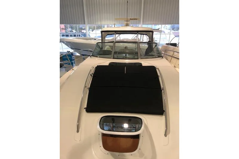 Slide: The Image of 2008 Sea Ray 400 Sundancer yacht, front deck view in marina setting. - 23