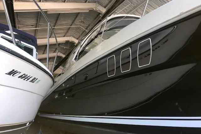 Slide: The Image of 2008 Sea Ray 400 Sundancer yacht in storage, side view. - 29