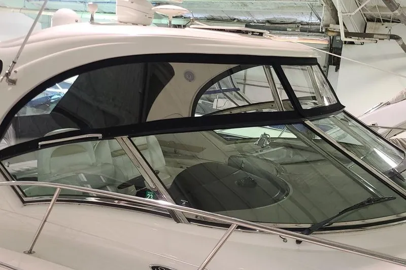 Slide: The Image of 2008 Sea Ray 400 Sundancer yacht with sleek design and spacious interior. - 4