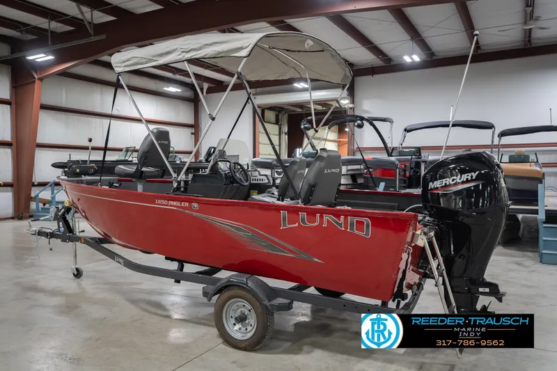 Slide: The Image of 2023 Lund 1650 Angler SS boat with Mercury engine in showroom. - 10