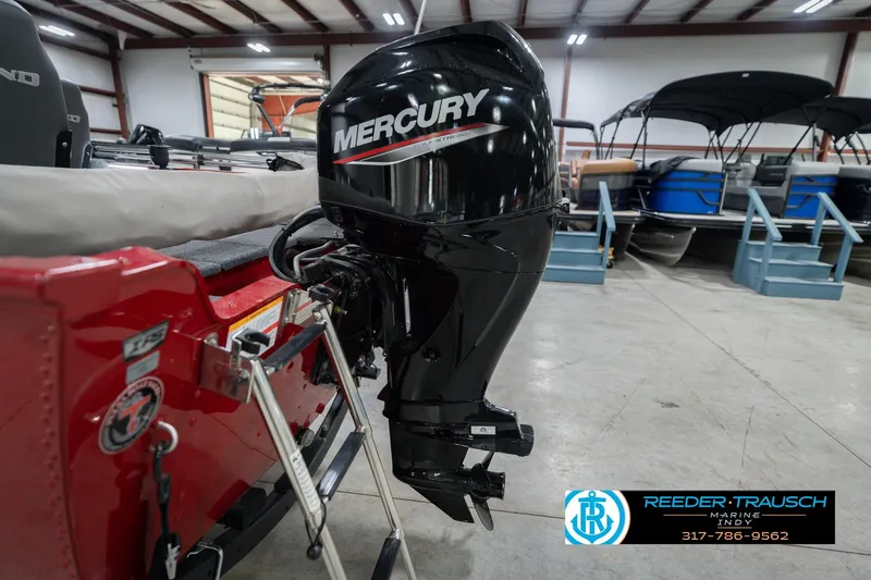 Slide: The Image of 2023 Lund 1650 Angler SS with Mercury outboard motor in showroom. - 41