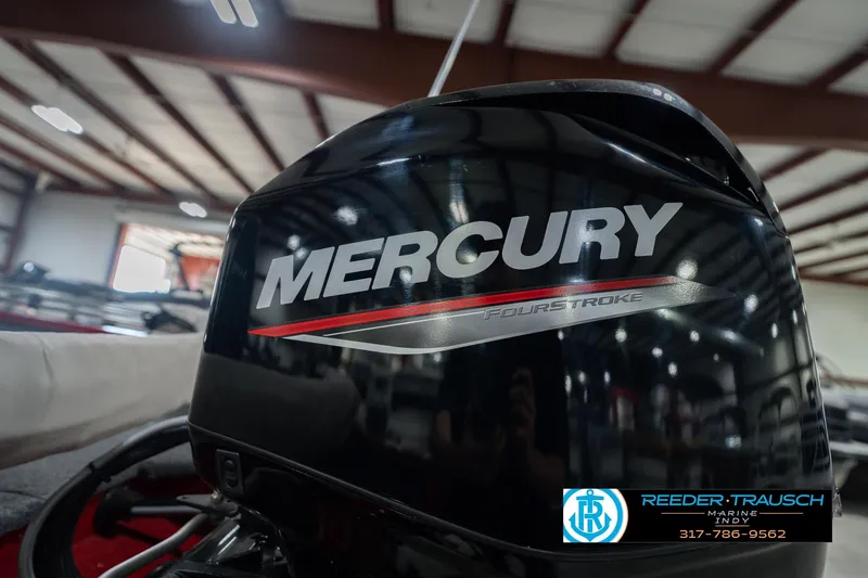 Slide: The Image of Mercury FourStroke engine on 2023 Lund 1650 Angler SS boat in showroom. - 42