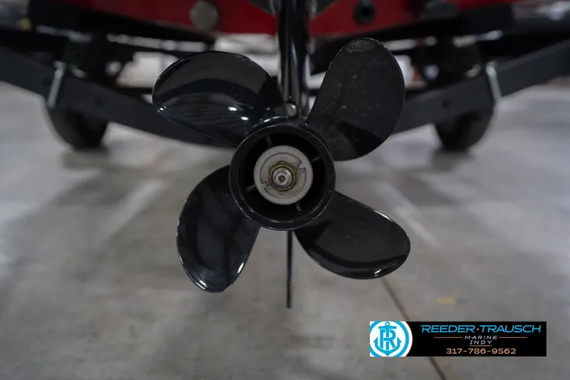 Slide: The Image of 2023 Lund 1650 Angler SS boat propeller, close-up view in a showroom. - 45