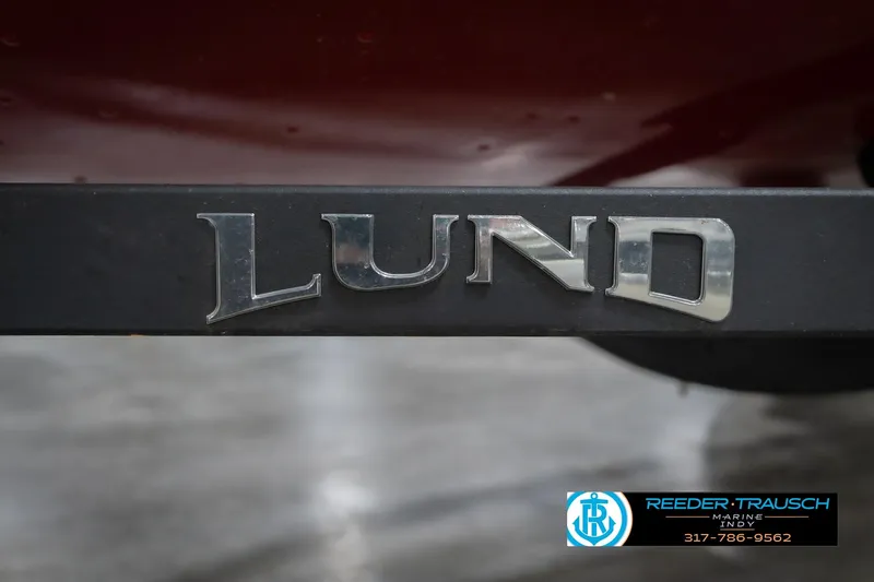 Slide: The Image of 2023 Lund 1650 Angler SS boat logo with Reeder-Trausch Marine contact details. - 52