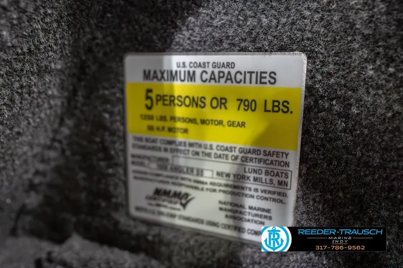 Slide: The Image of 2023 Lund 1650 Angler SS capacity label, 5 persons or 790 lbs, safety compliance. - 58