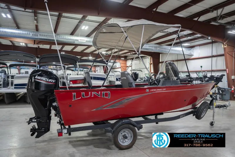 Slide: The Image of 2023 Lund 1650 Angler SS boat with Mercury engine in showroom. - 8