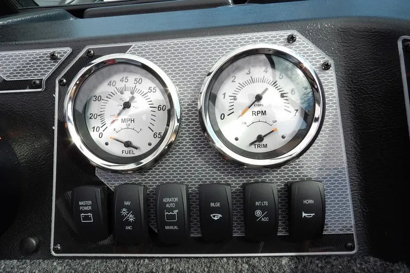 Slide: The Image of Dashboard of 2026 Lund 1775 Adventure Sport with speedometer and RPM gauges. - 26