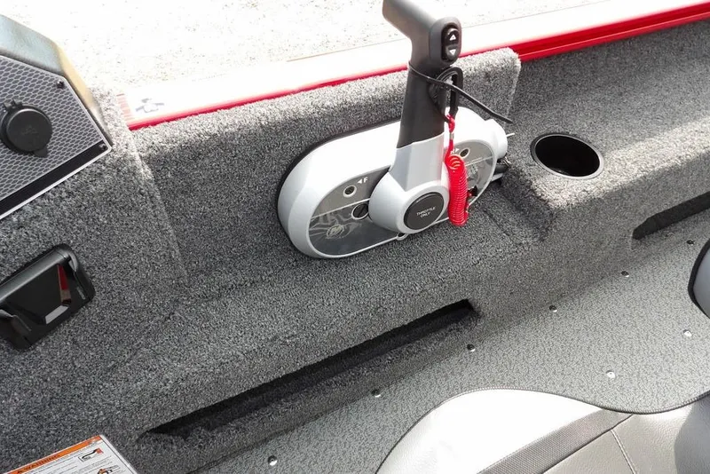 Slide: The Image of Interior of 2026 Lund 1775 Adventure Sport boat with throttle control and cup holder. - 27