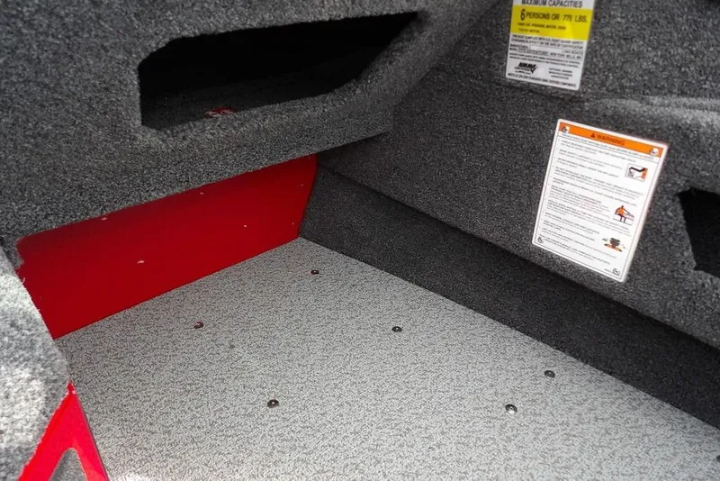 Slide: The Image of Interior view of 2026 Lund 1775 Adventure Sport boat storage compartment. - 30