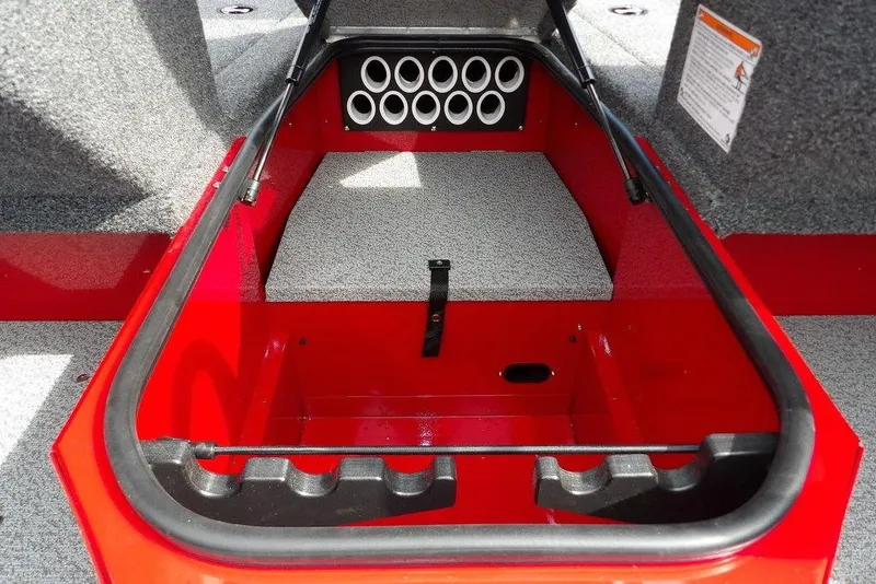 Slide: The Image of 2026 Lund 1775 Adventure Sport boat interior with rod storage compartment. - 39